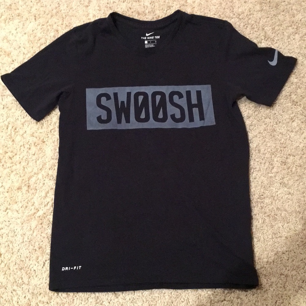 Swoosh Nike tee.